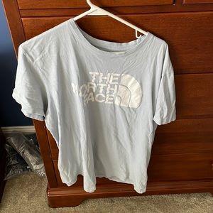 Light blue north face shirt